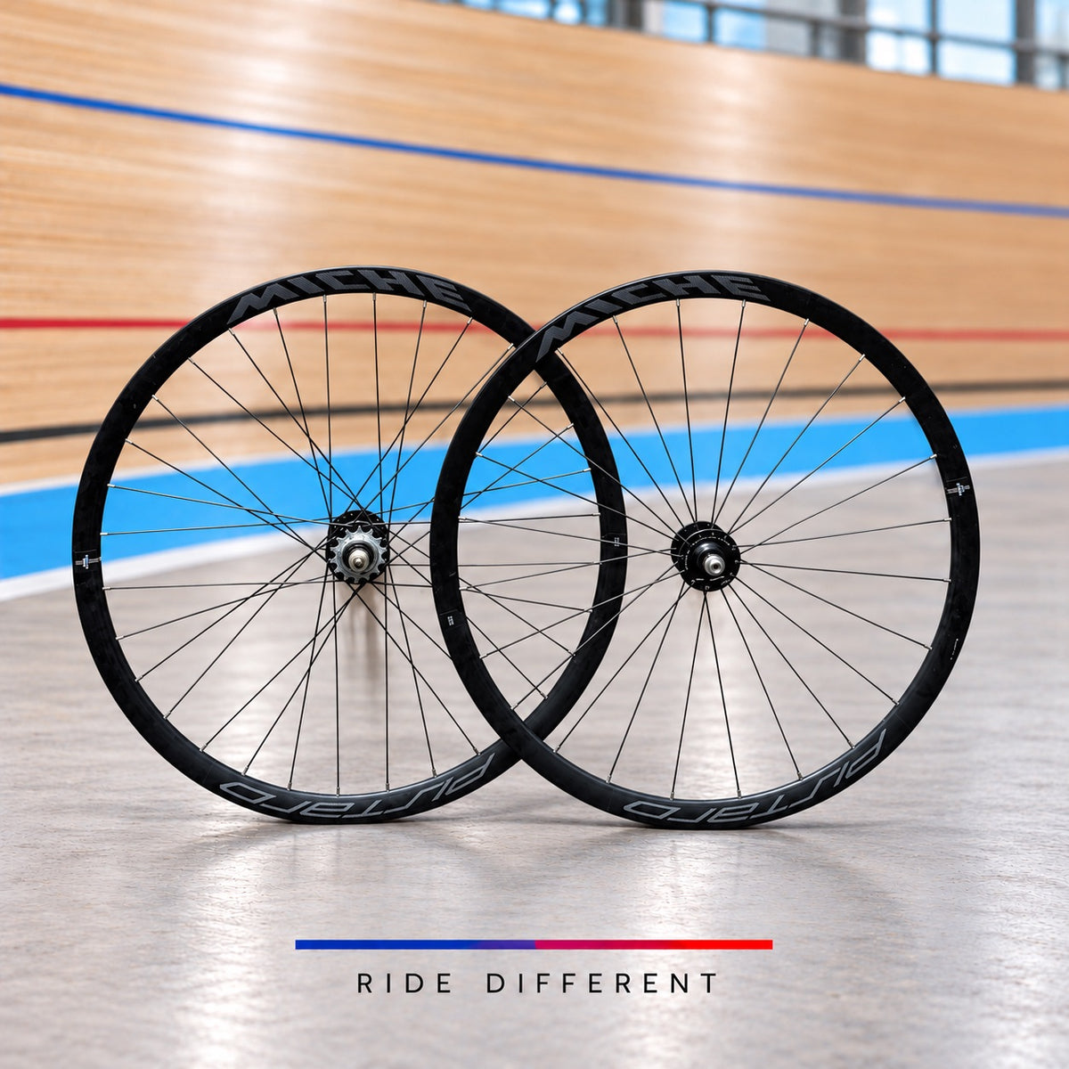 Black Miche Pistard 700c clincher track wheelset against a velodrome background