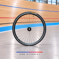 Gran Compe H Plus Son 700c track front wheel – side view on velodrome background
