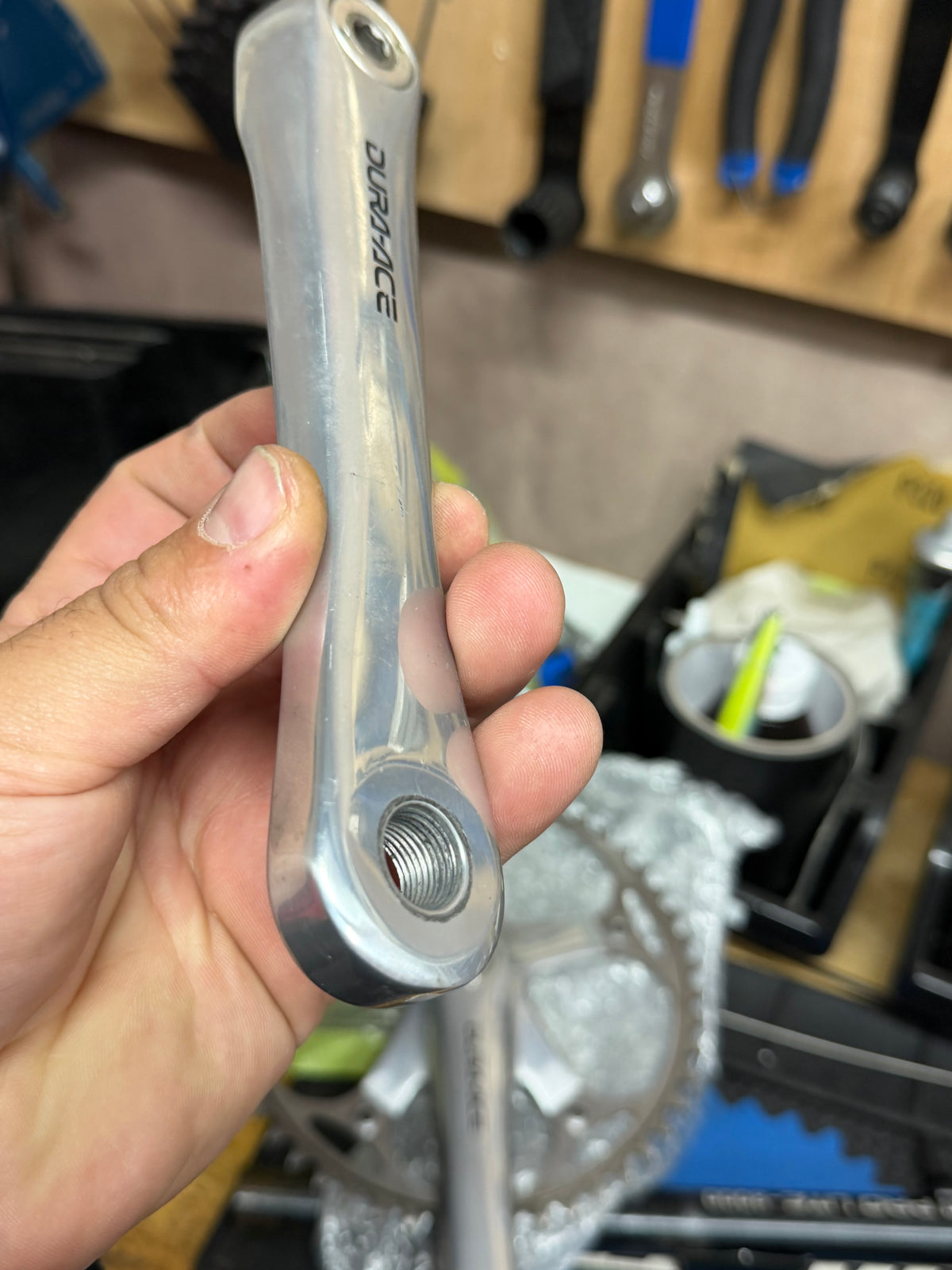 Angled view of Dura-Ace non-drive-side crank showing surface wear