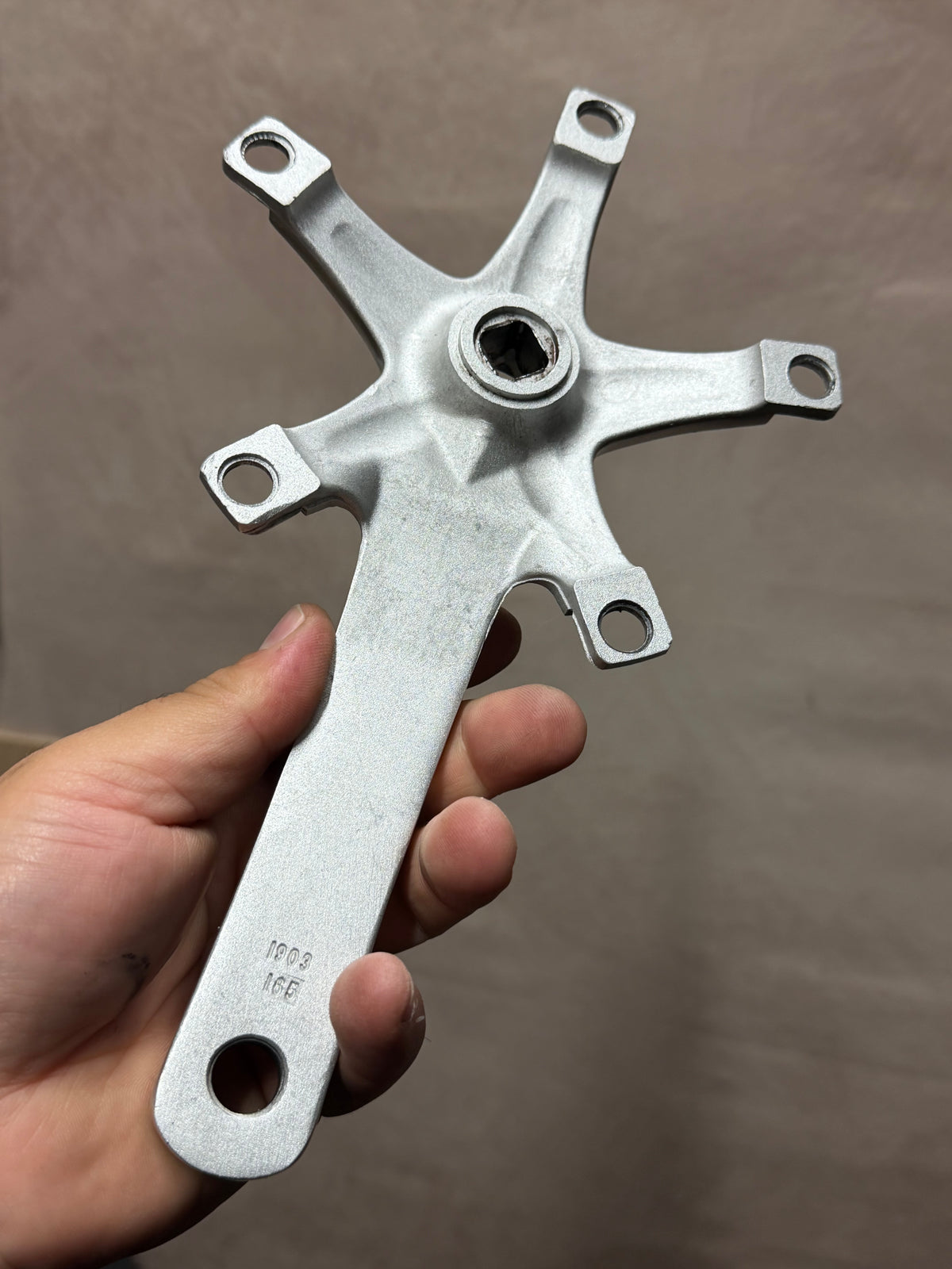 Rear of Stronglight five-arm crank spider and axle opening