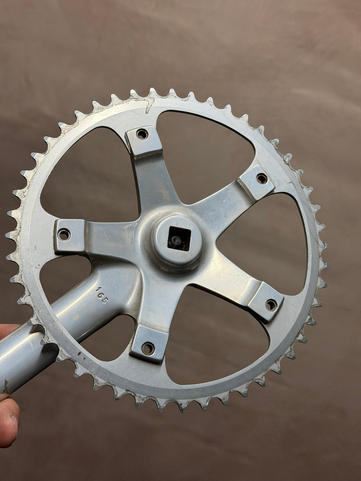 Reverse face of Miche track crank spider and chainring