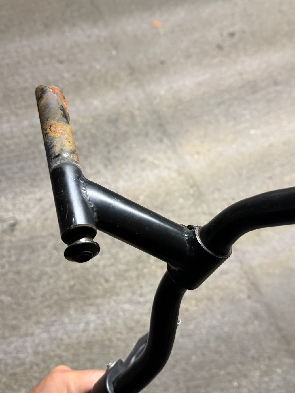 Quill stem insertion shaft showing visible corrosion