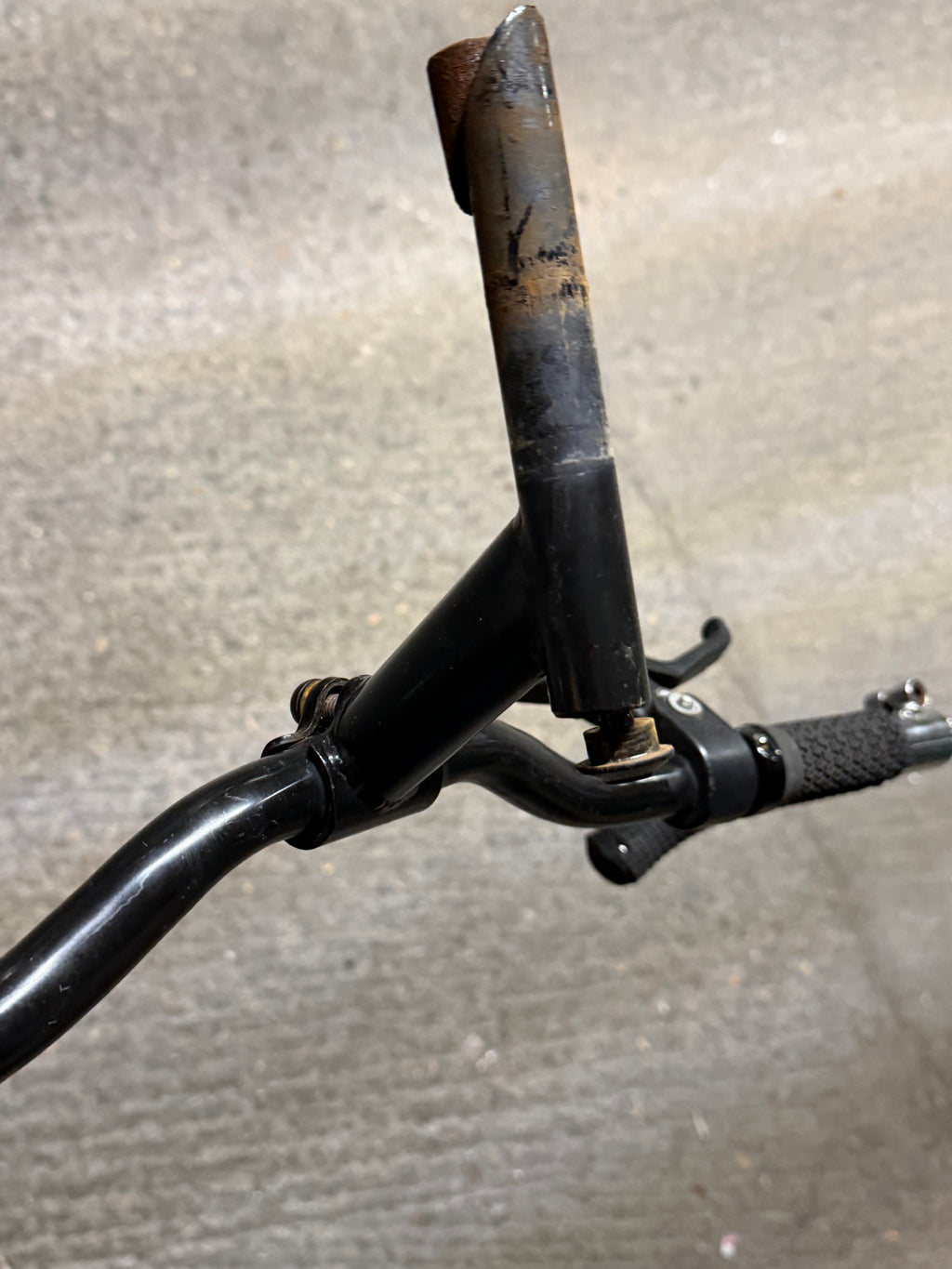 Underside of MTB quill stem showing insertion shaft