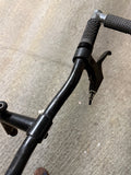 Black MTB handlebar with grip and brake lever