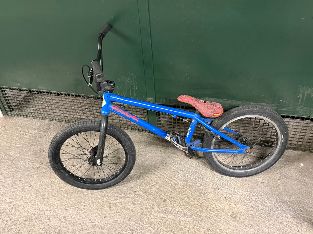 Side view of complete blue Sunday kids' BMX bike
