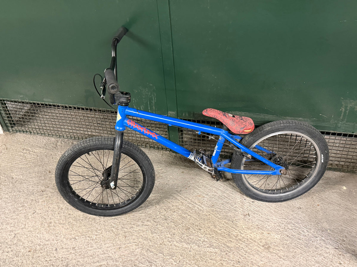 Side view of complete blue Sunday kids' BMX bike