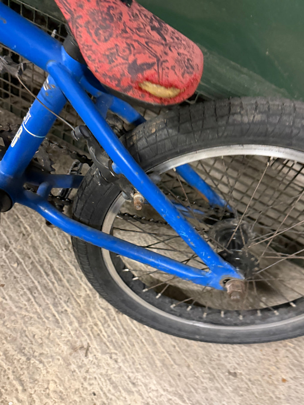 Rear frame and red saddle of blue Sunday BMX