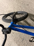 Overhead view of blue Sunday kids' BMX frame and handlebars