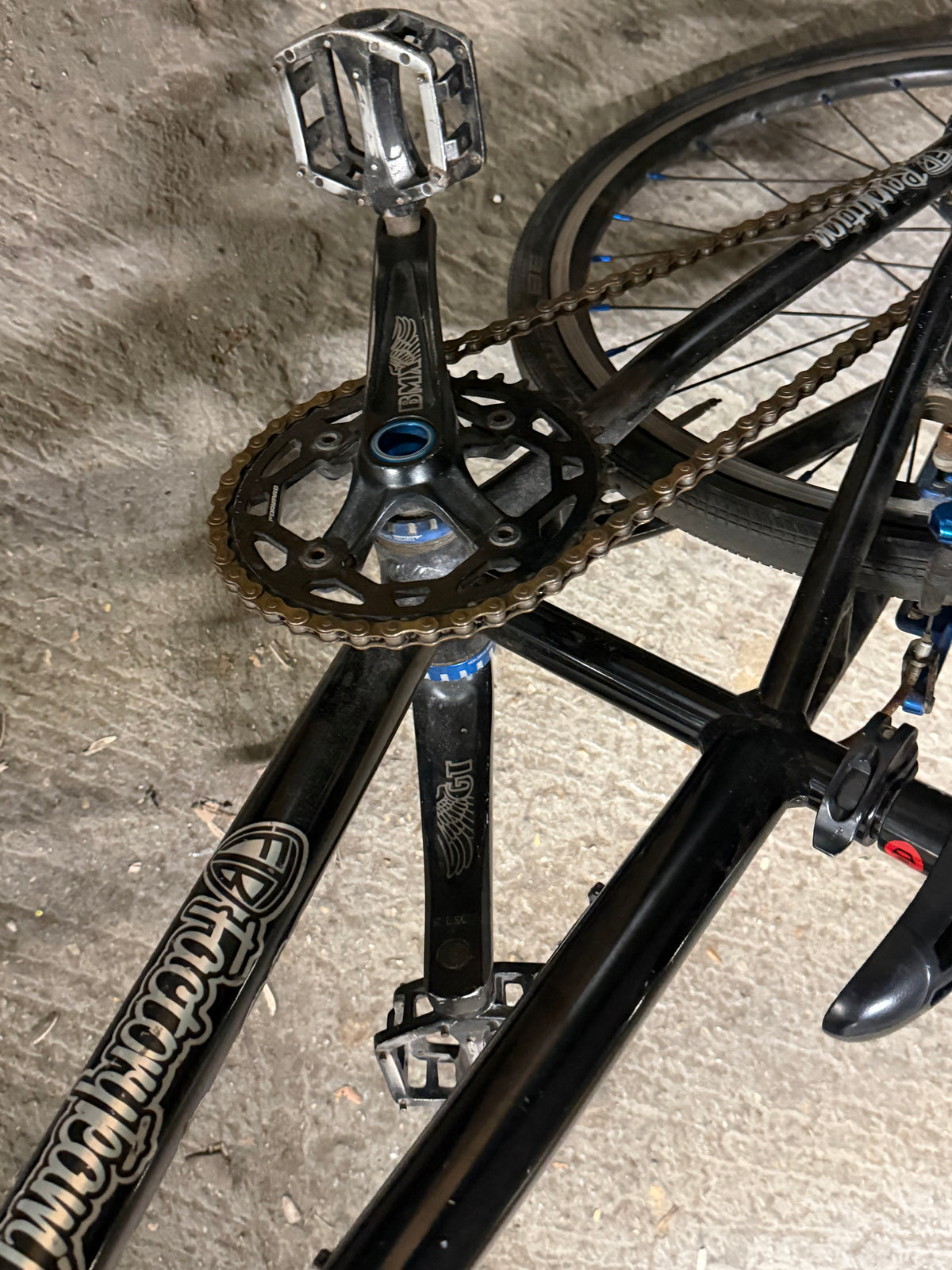 BMX crankset, pedal and Factory Team Bikes frame logo