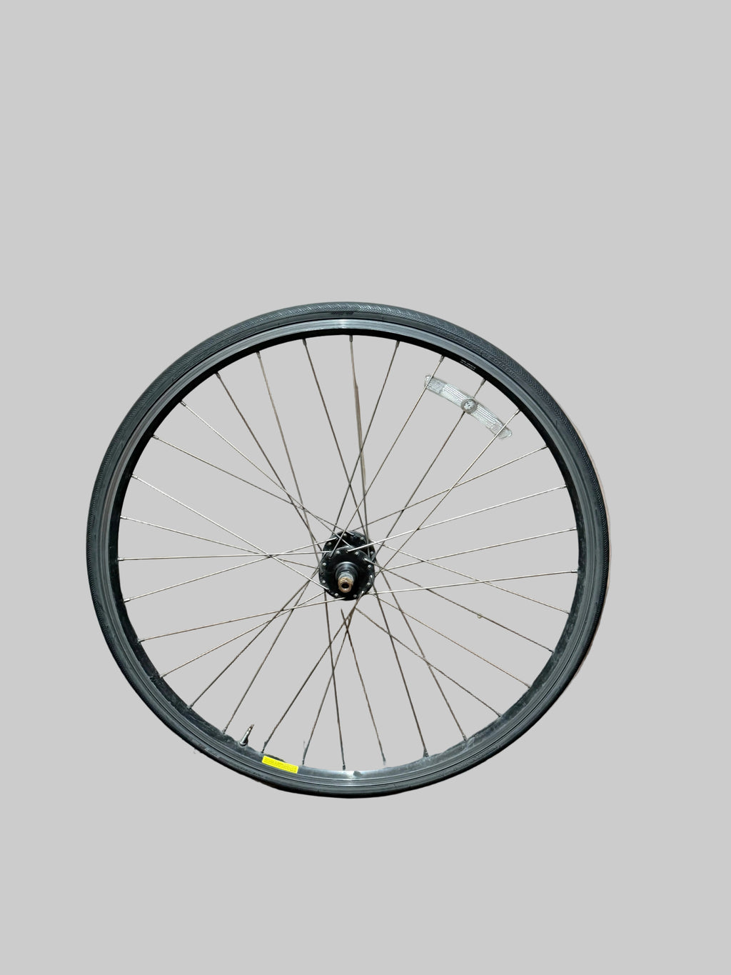 700c clincher track front wheel – complete wheel against plain grey background