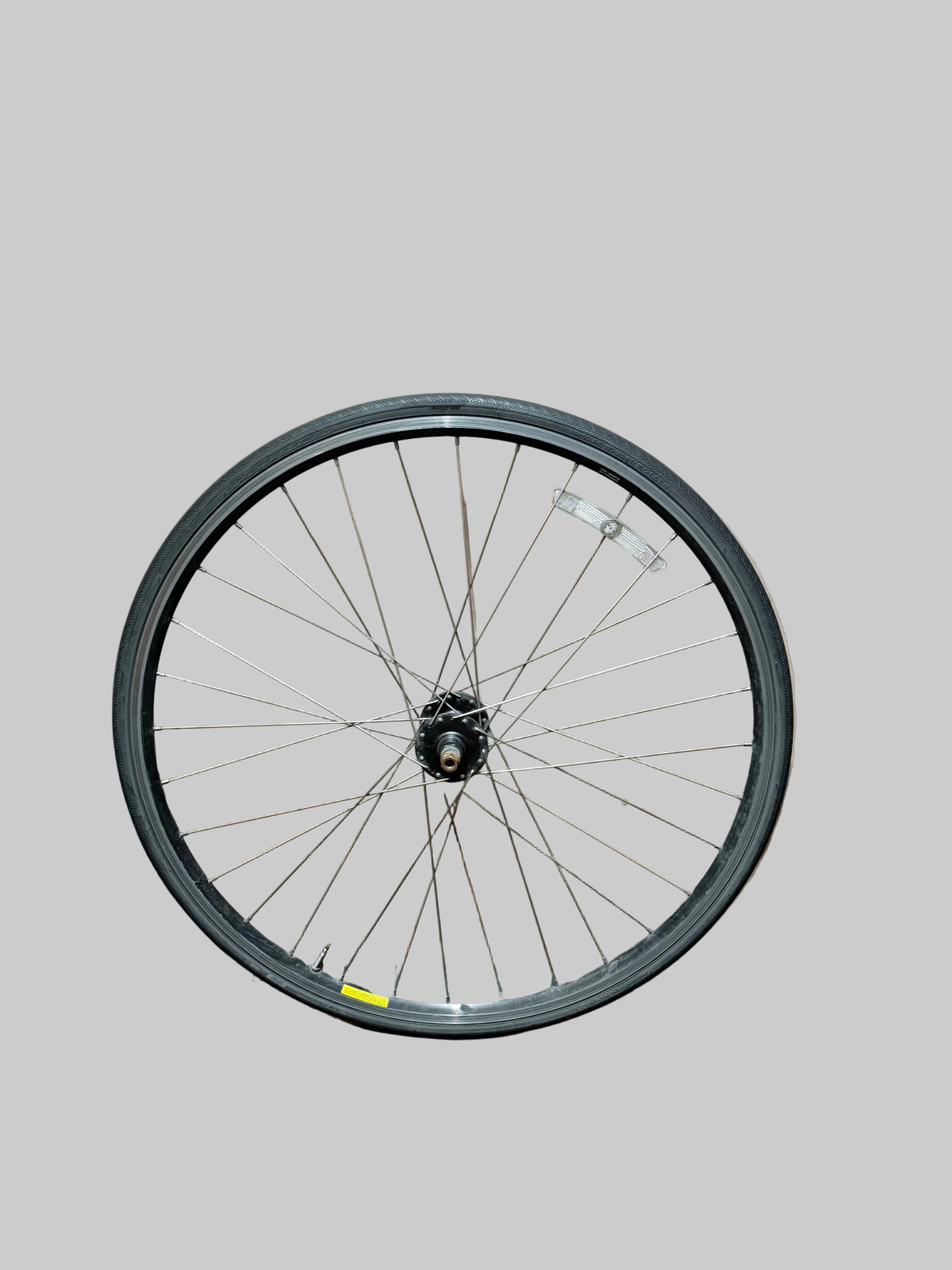 700c clincher track front wheel – complete wheel against plain grey background