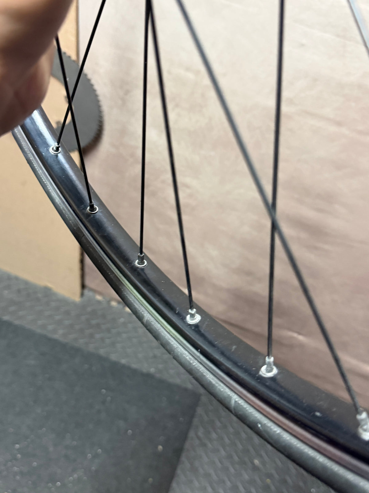 Gran Compe H Plus Son 700c track rear wheel – rim and tyre held at an angle