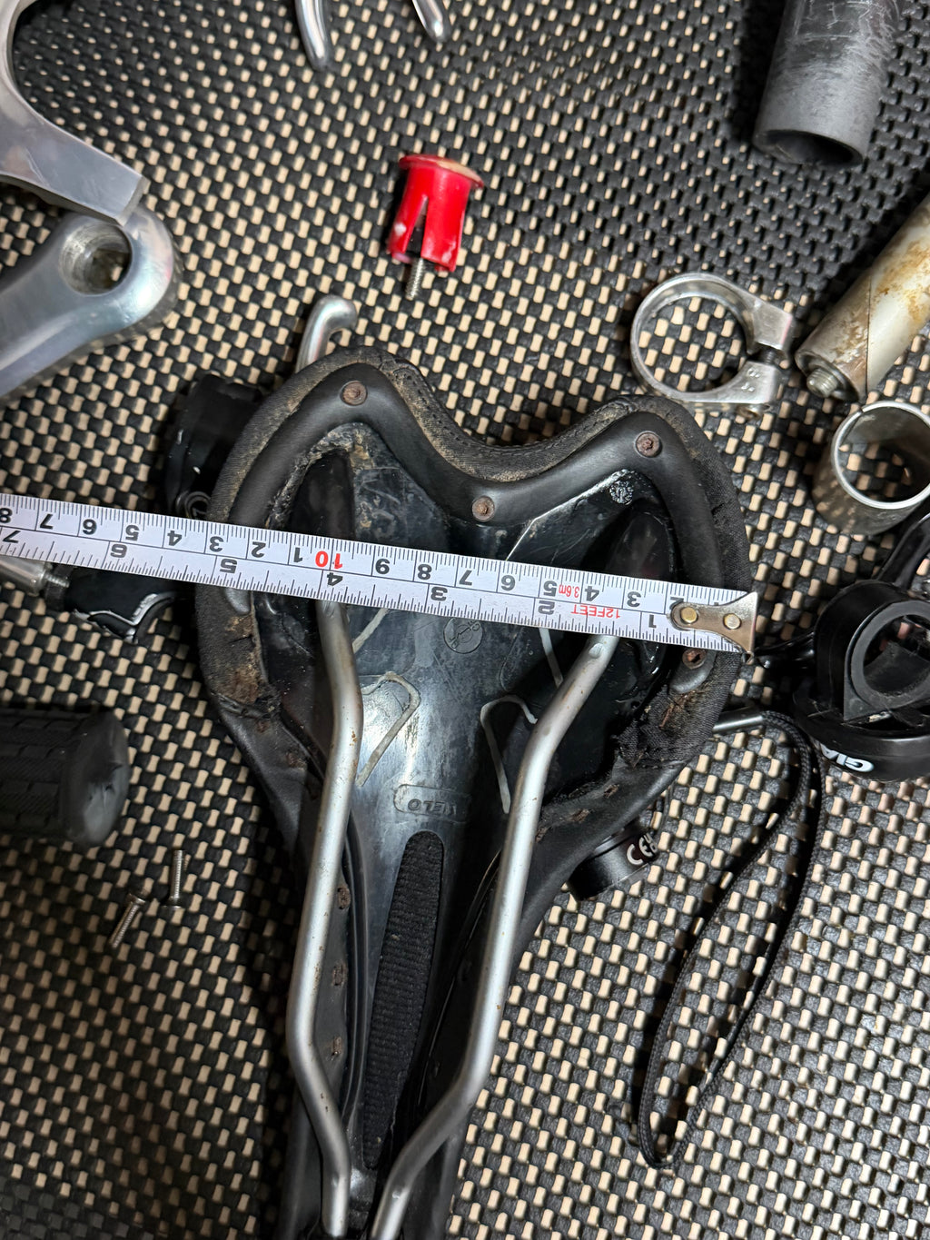 Black Bicycle Saddle – width beside tape measure