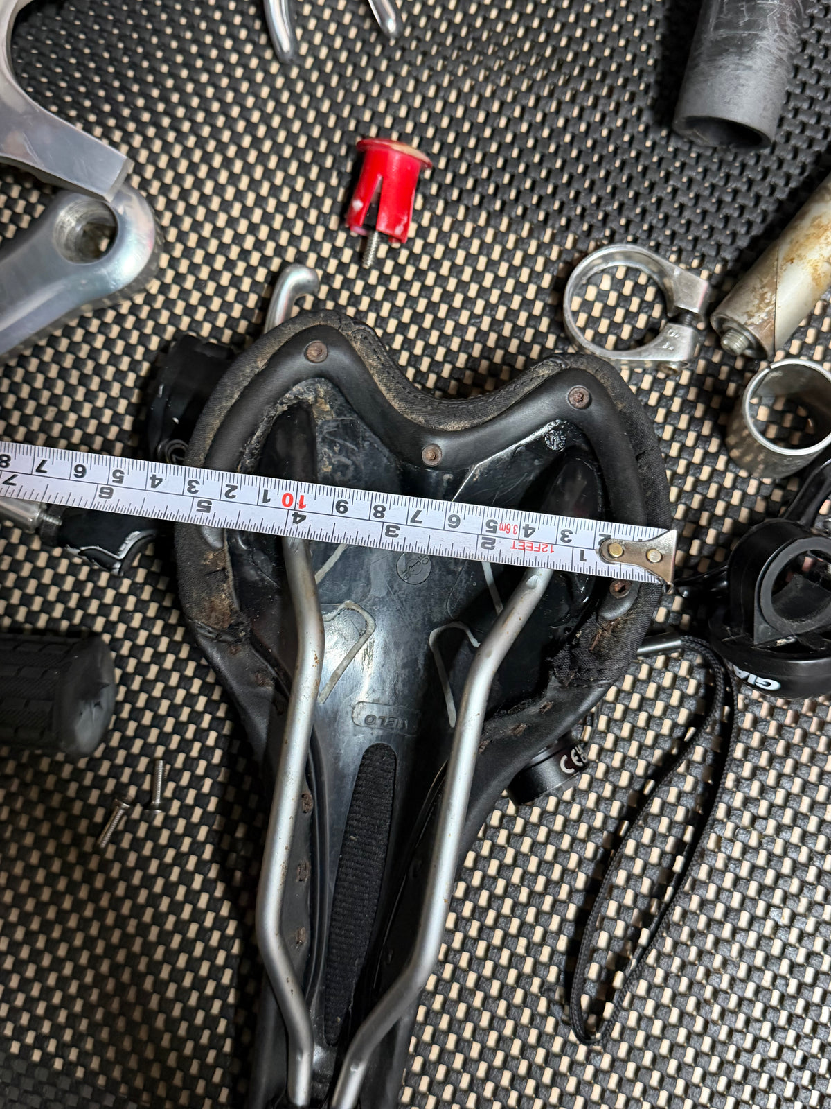 Black Bicycle Saddle – width beside tape measure