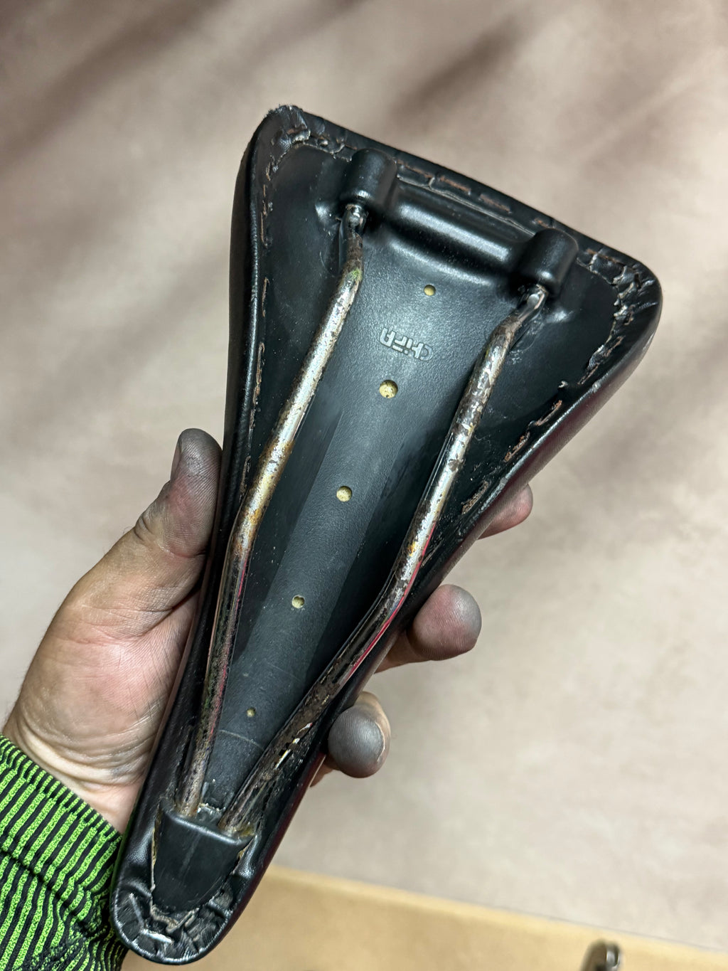 Bicycle Saddle – Side Damage – underside and rails