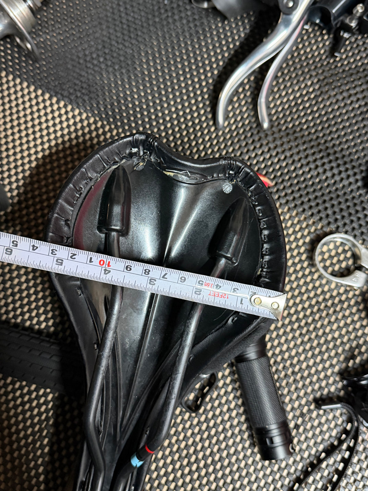 Hoy Bicycle Saddle – width beside tape measure