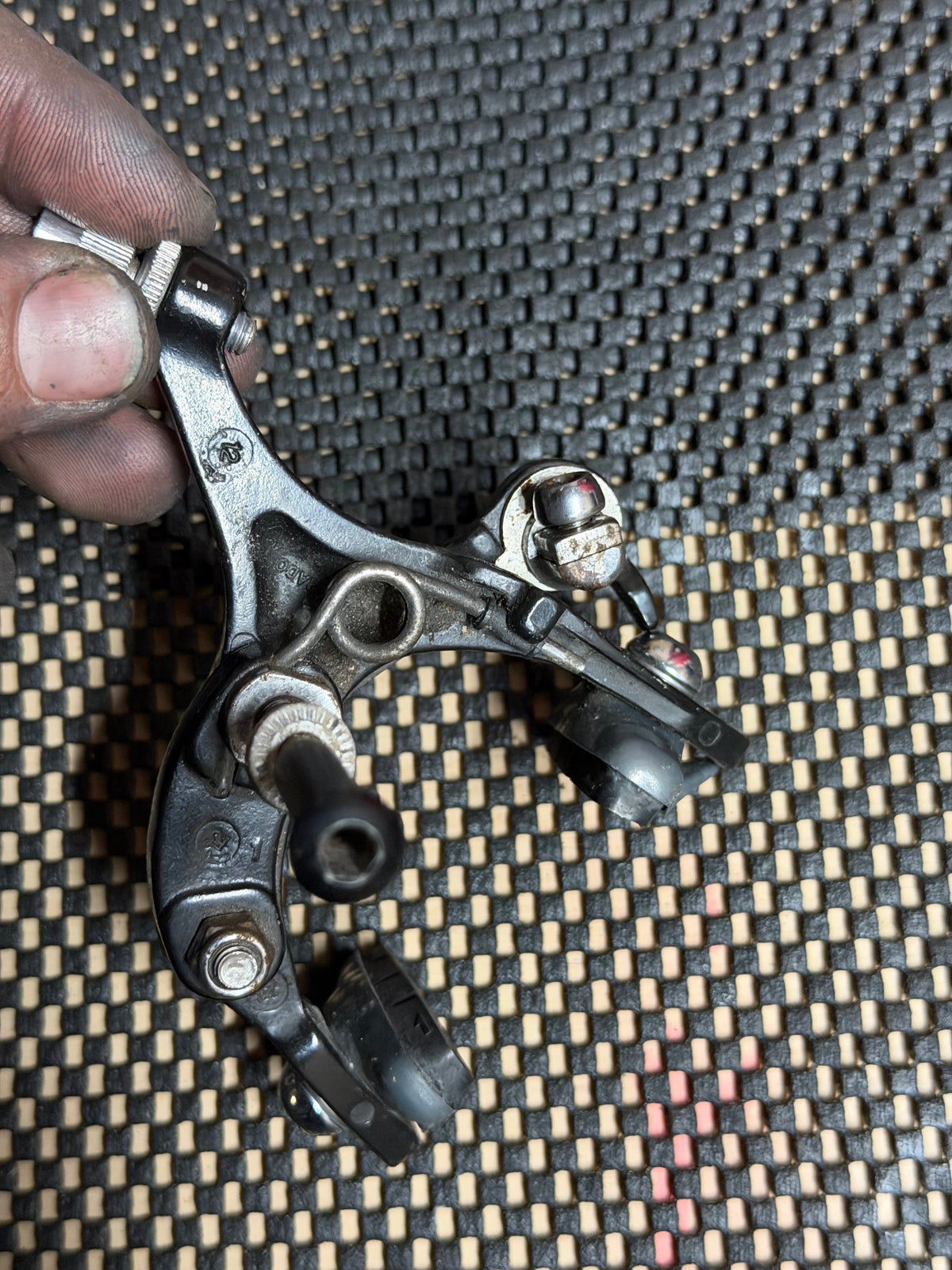 Front Bicycle Rim Brake Caliper – rear face and mounting bolt