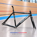 Black Dolan Pre Cursa 52cm track frameset against a velodrome background